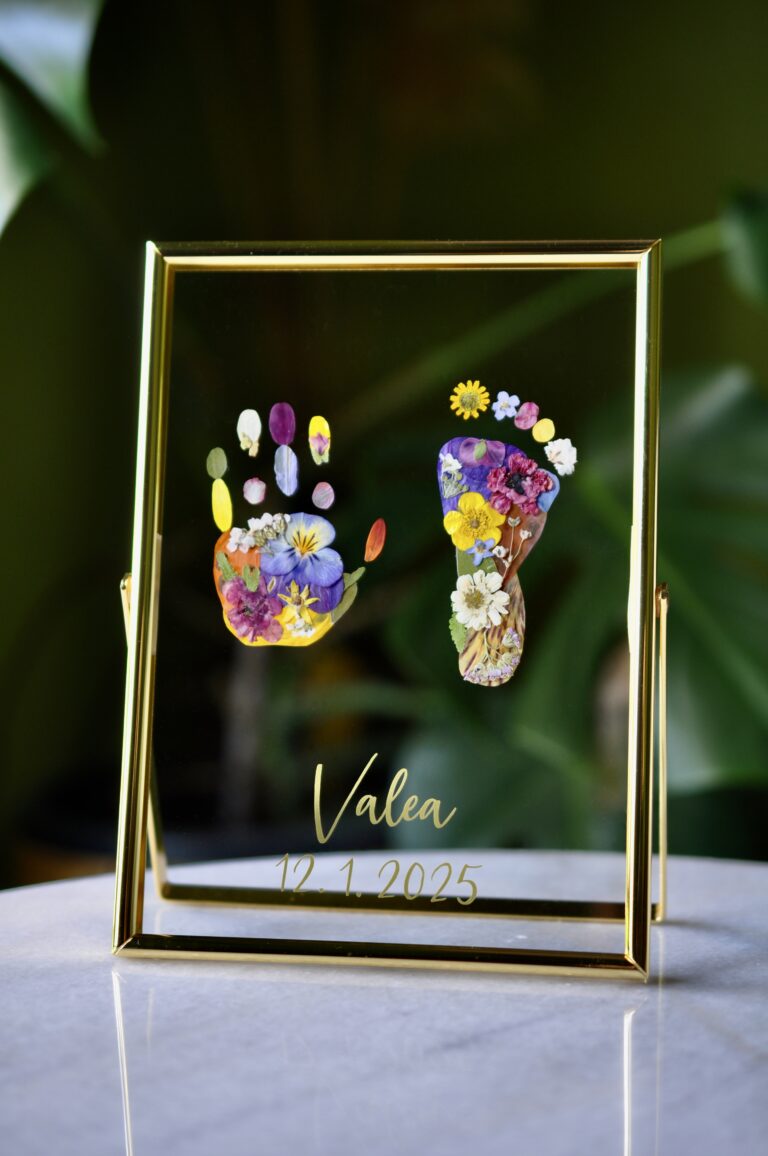 Personalised baby hand and footprint made from real pressed flowers with the name Valea and date of birth.