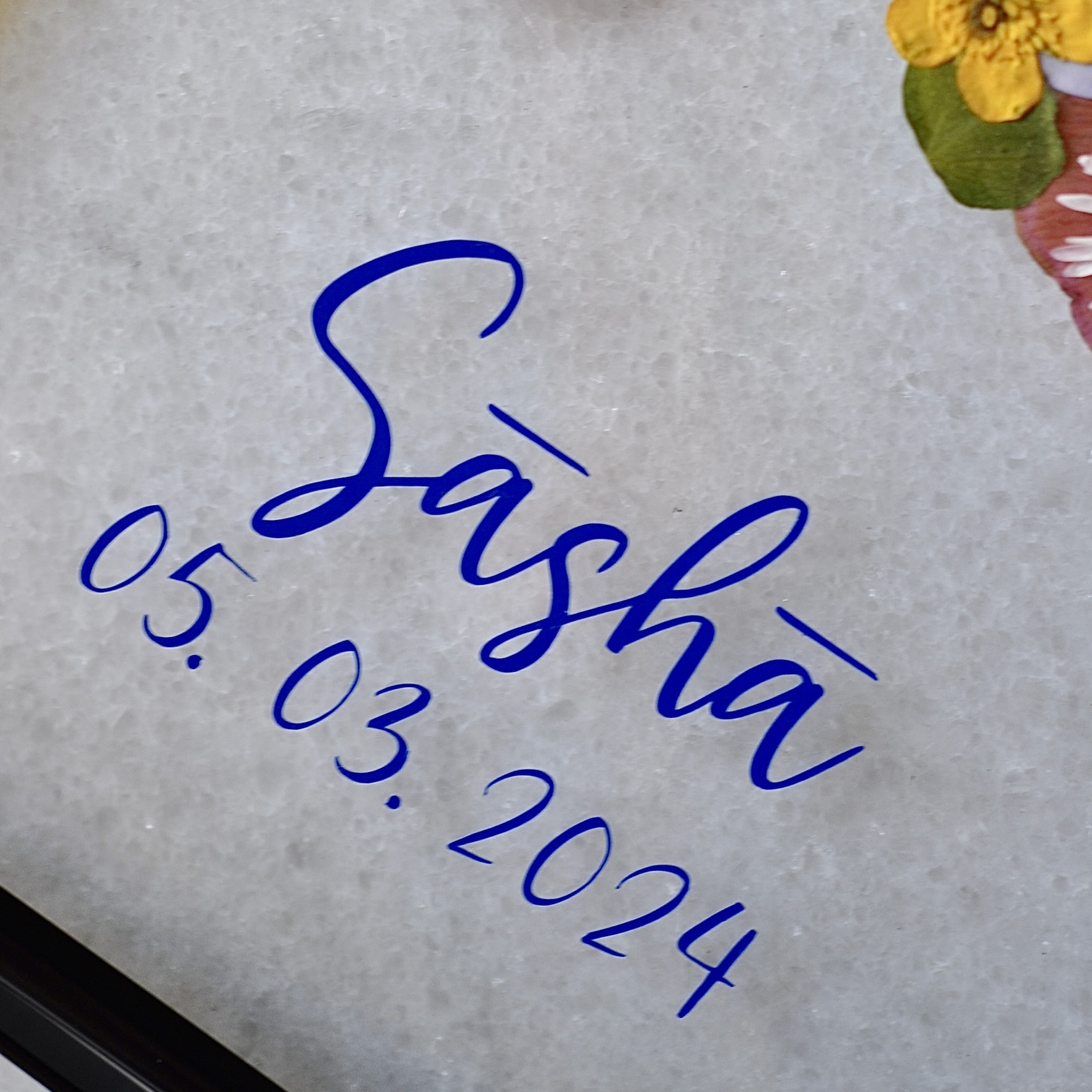 Baby keepsake with blue name and birth date label