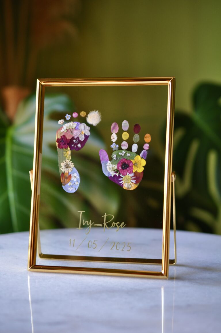 Baby hand and footprint keepsake in an elegant gold frame – custom floral artwork with real pressed flowers, perfect for a newborn gift.