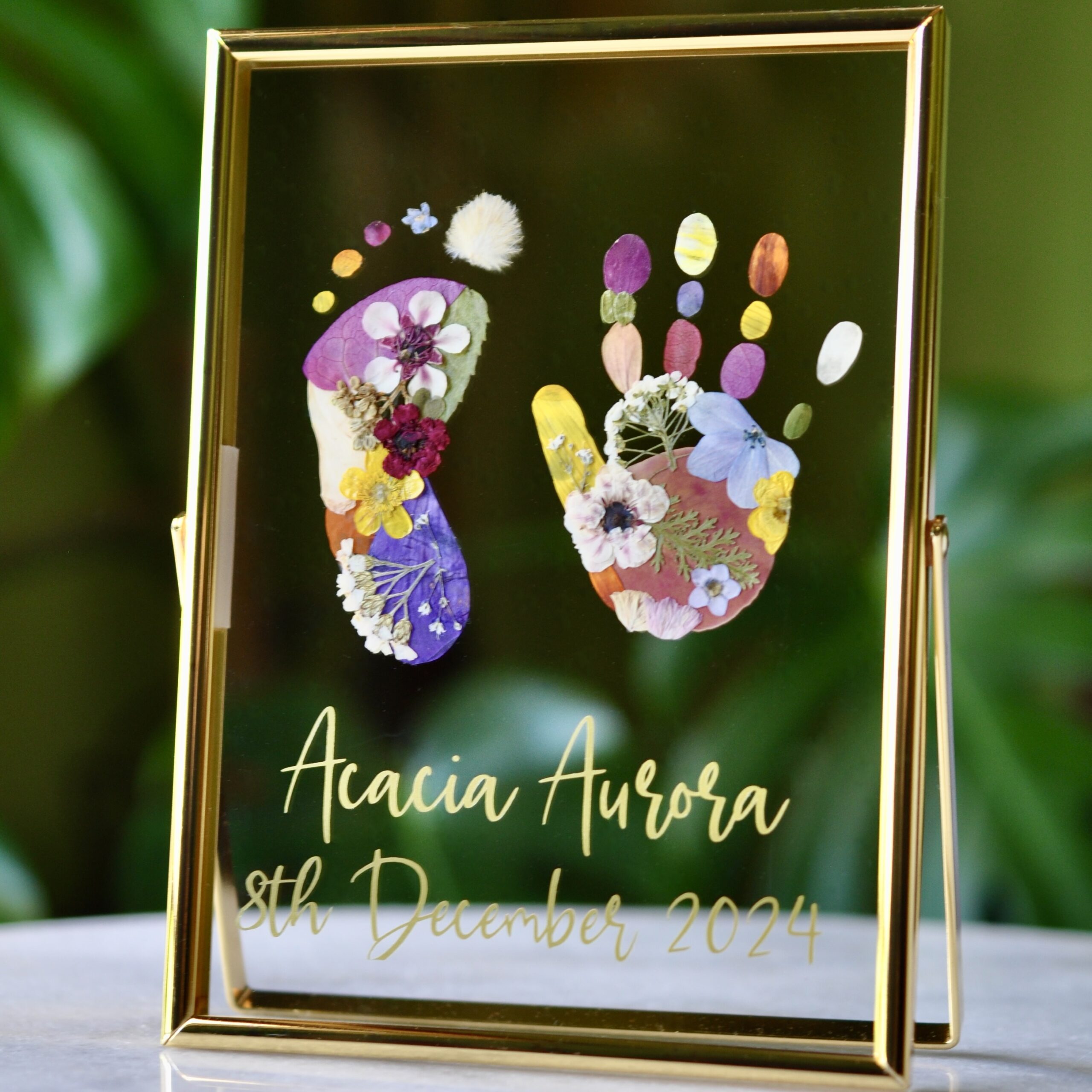 Toddler Keepsake out of pressed flowers in golden frame