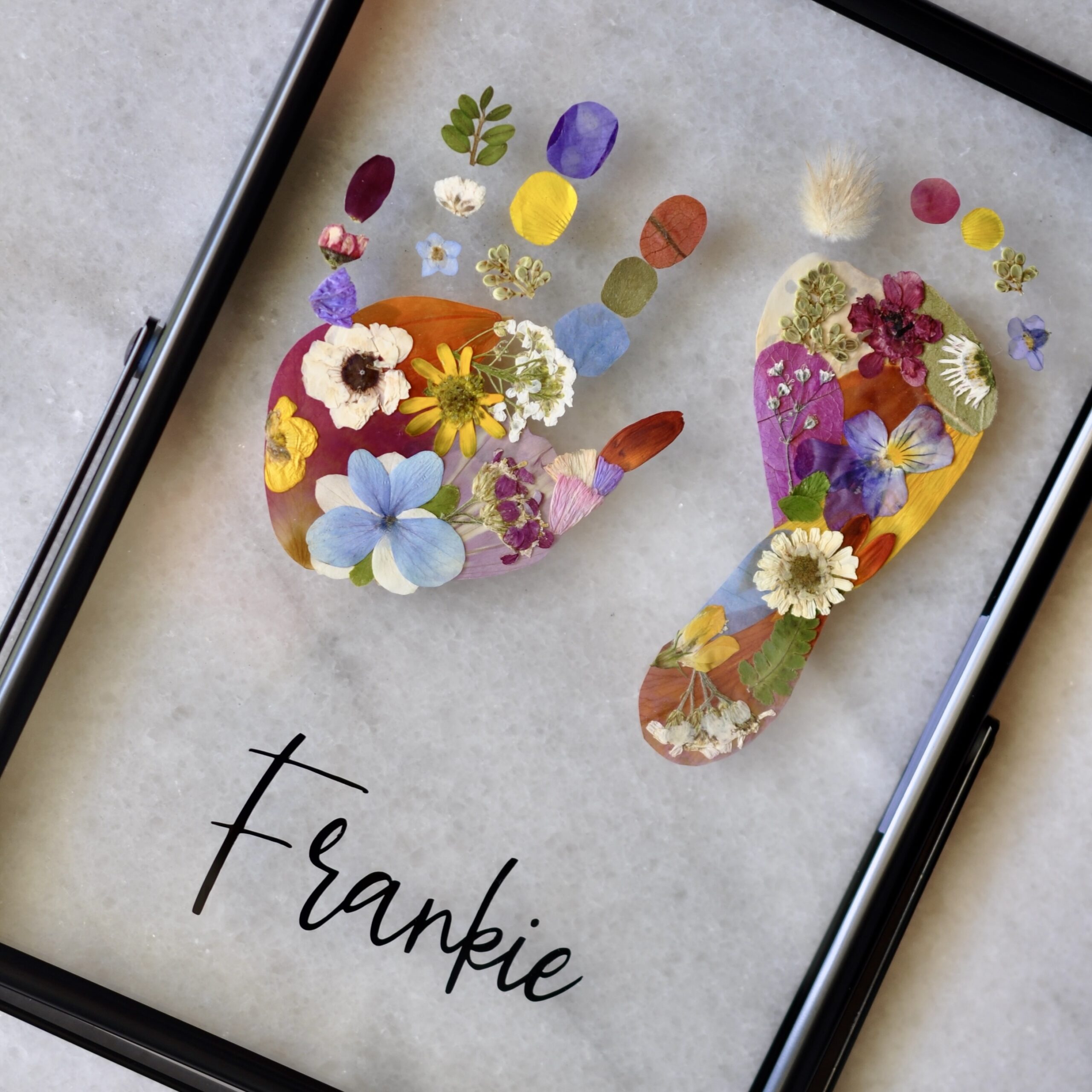 Toddler Hand & Footprint made out of pressed flowers