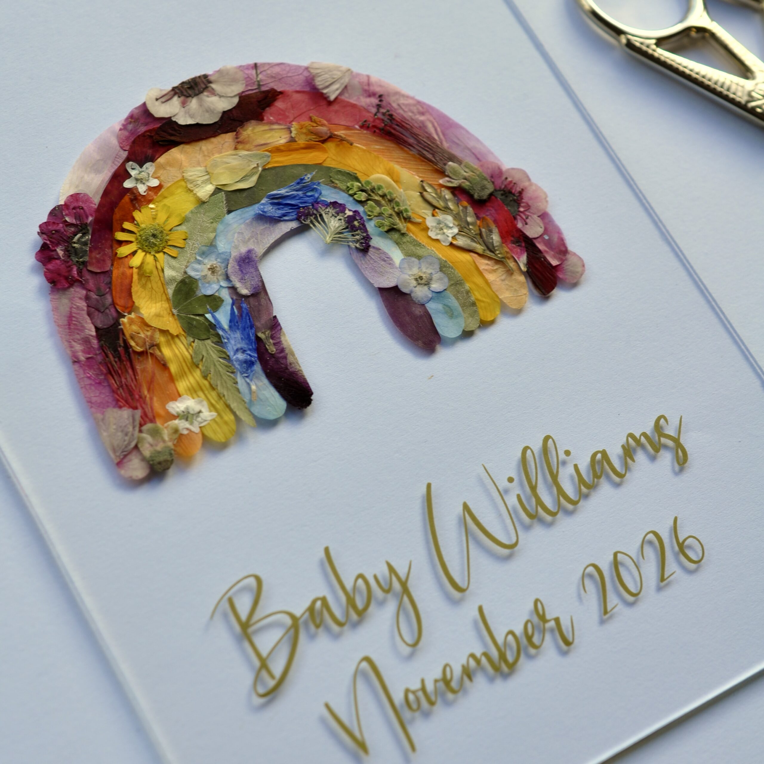 Rainbow out of pressed flowers as a meaningful remembrance piece for miscarriages