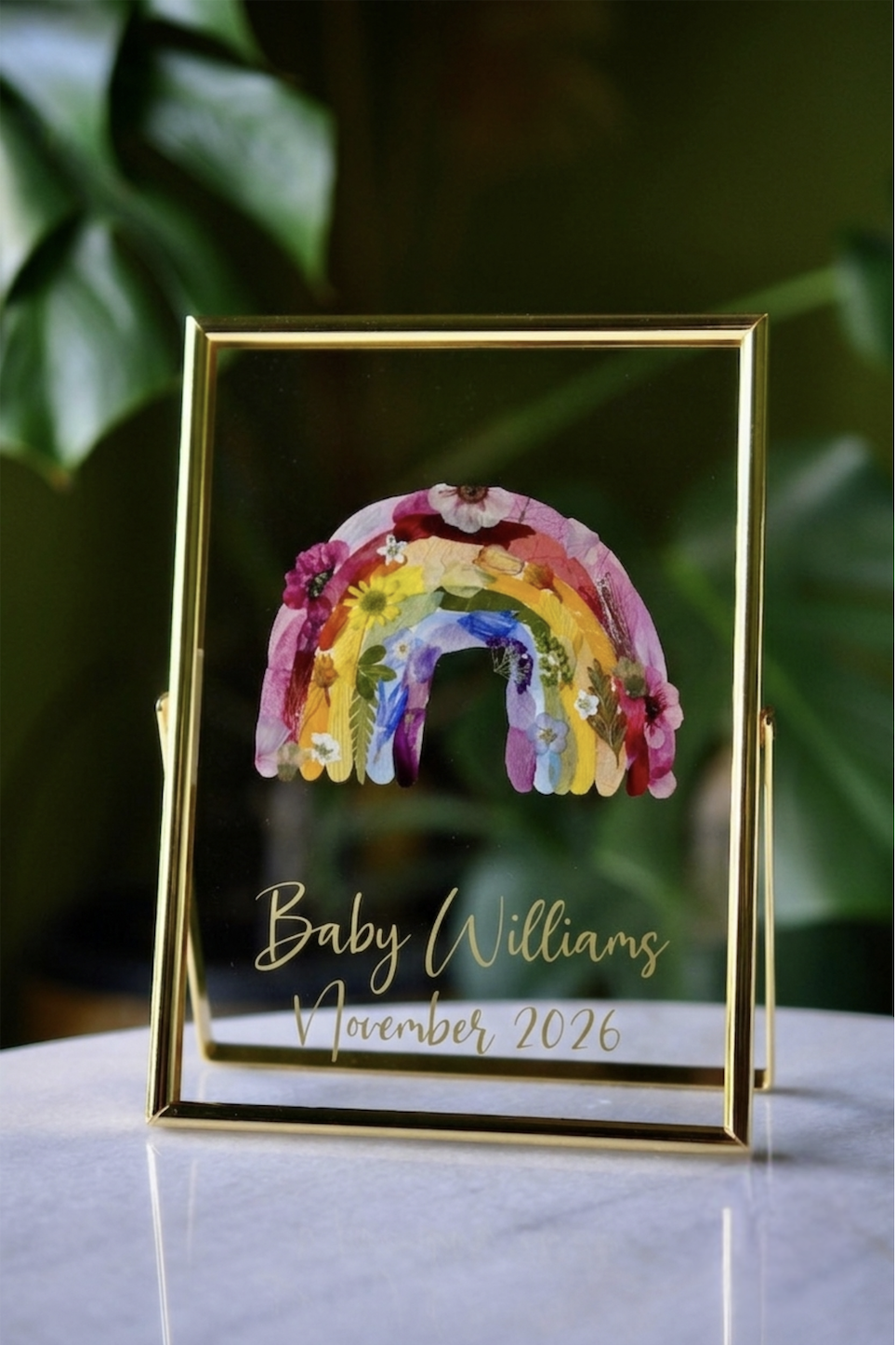 Vibrant Rainbow made out of pressed flowers in floating glass frame with writing
